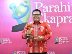 PJ Bupati M. Haris Terima Penganugerahan Parahita Ekapraya